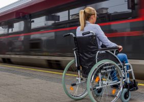 Image of wheelchair user at train station