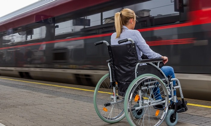 Image of wheelchair user at train station
