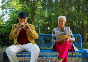 Elderly People sitting on a bench